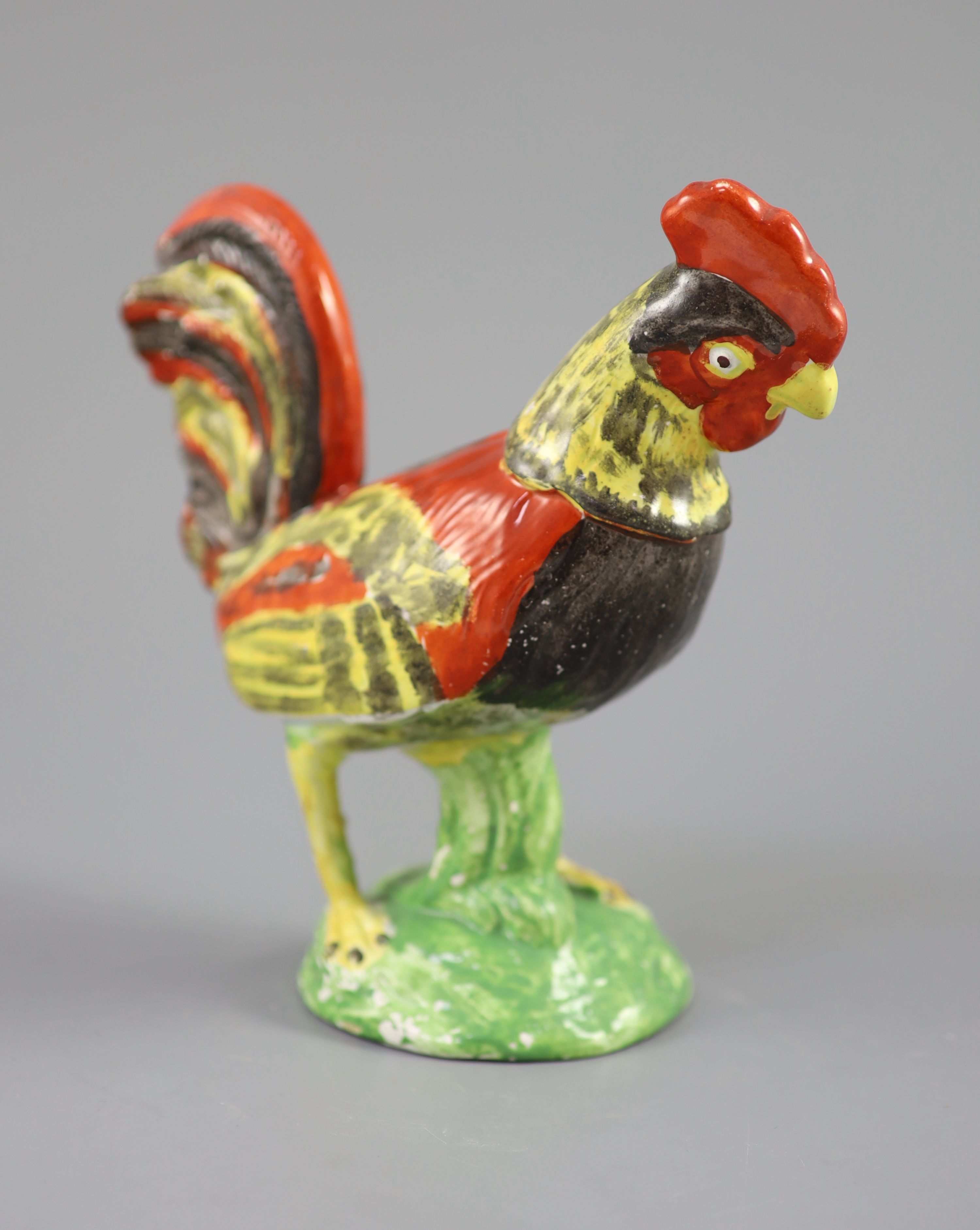 A Staffordshire pearlware figure of a cockerel, c.1820, 19cm high